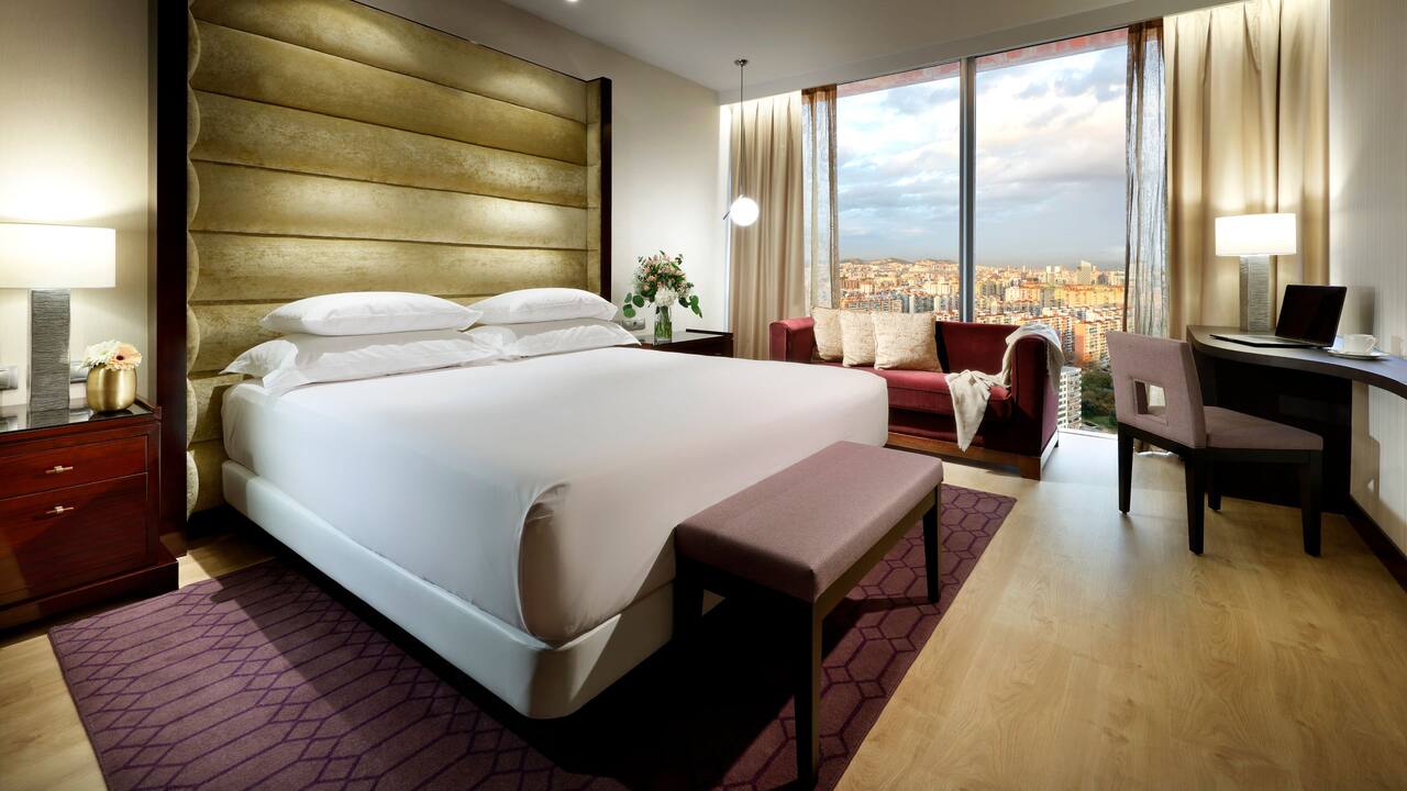 King guestroom with panoramic city views at Hyatt Regency Barcelona Tower