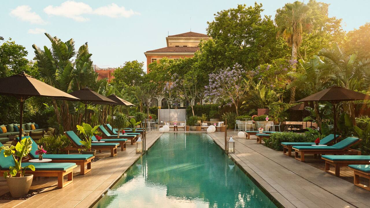 Grand Hyatt Barcelona outdoor swimming pool and landscaped terrace